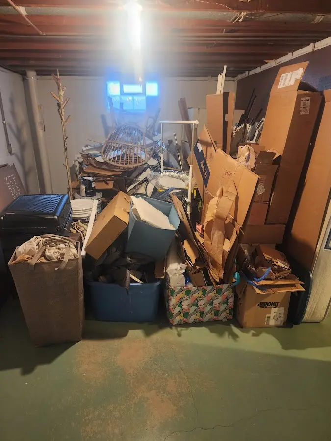 Roll-off dumpster container at job site for Cleanout Dumpster Rental in Strawberry Plains